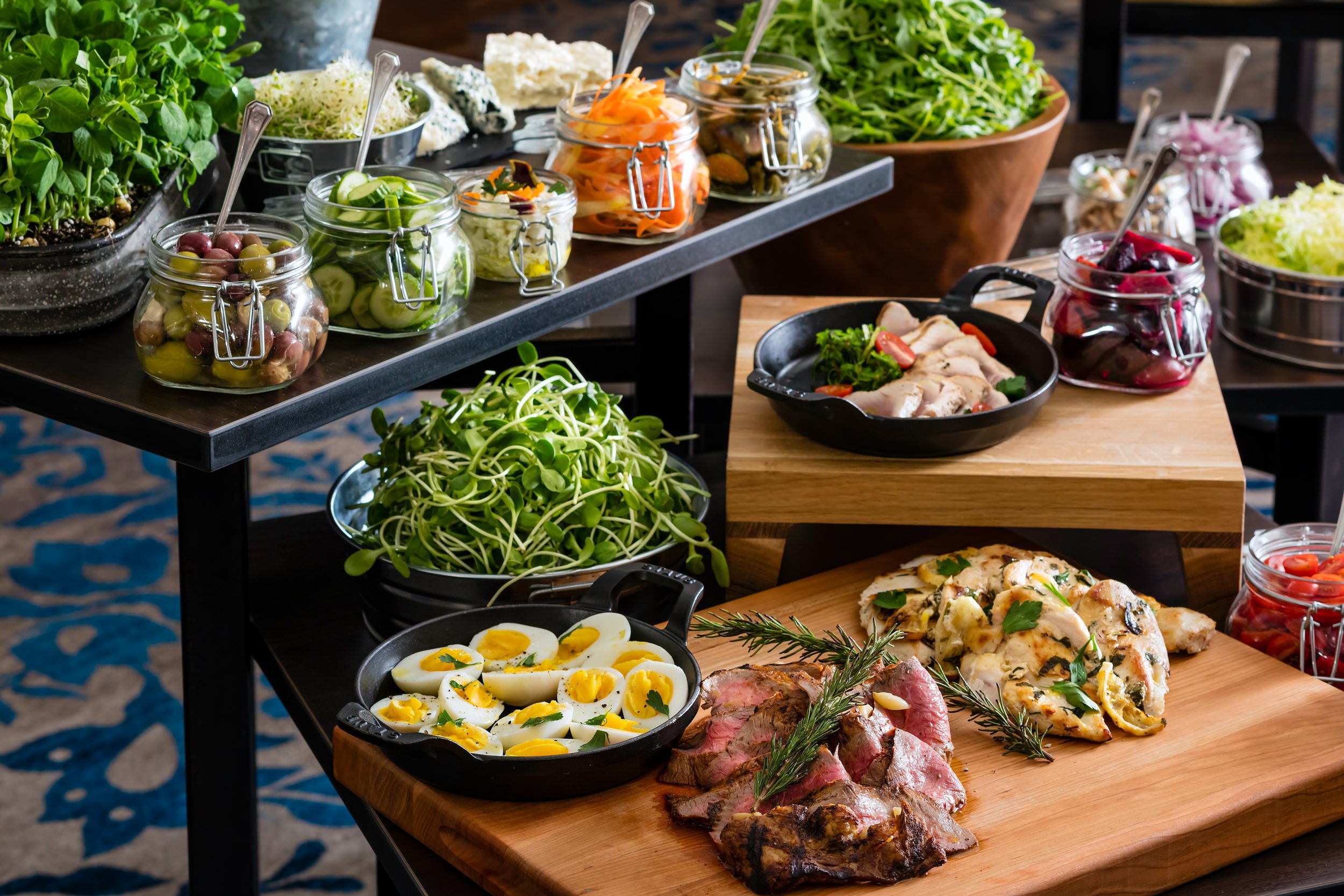 buffet with self-serve vegetables and meat