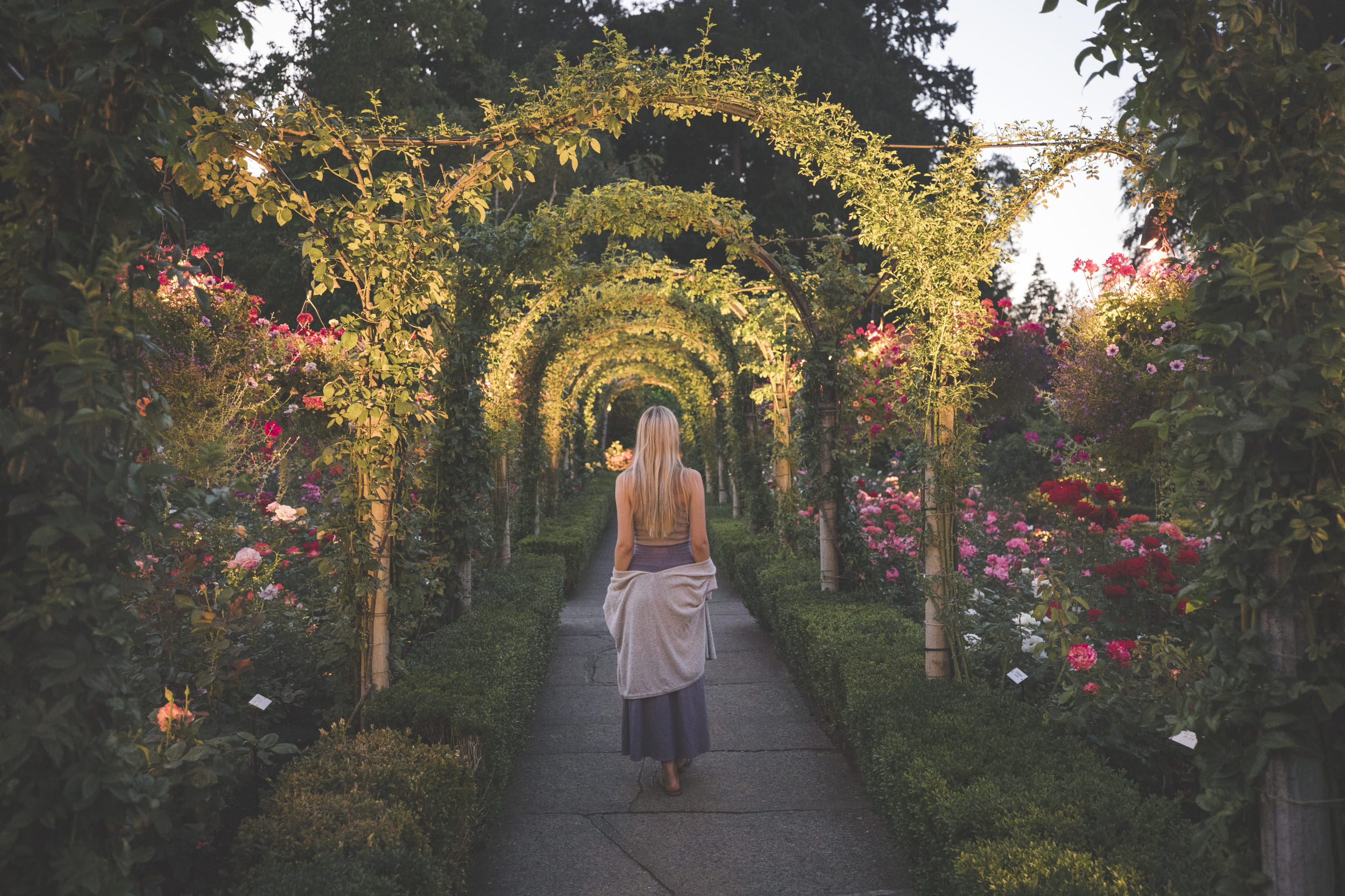 woman walking through park