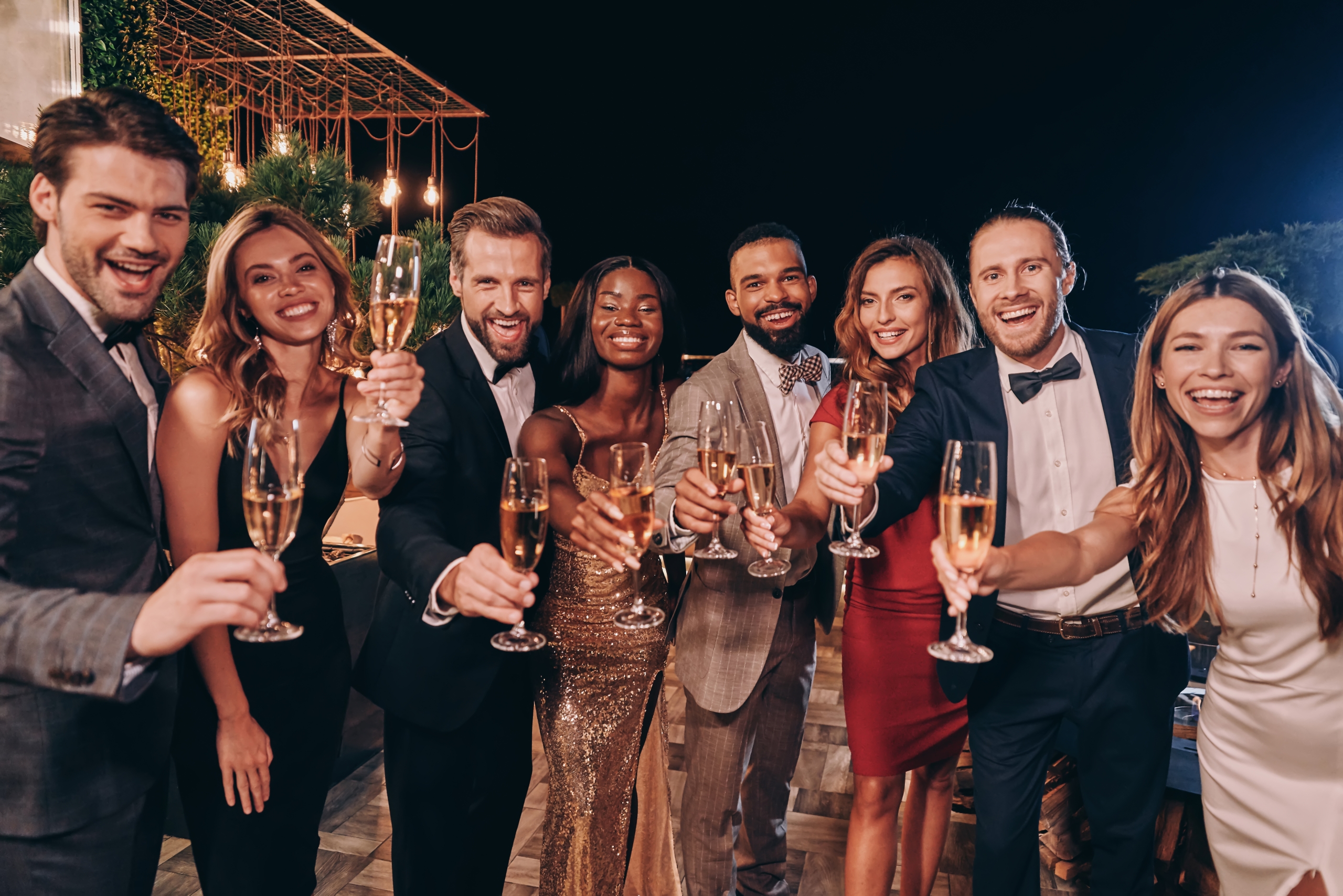 Friends celebrating with a toast of champagne