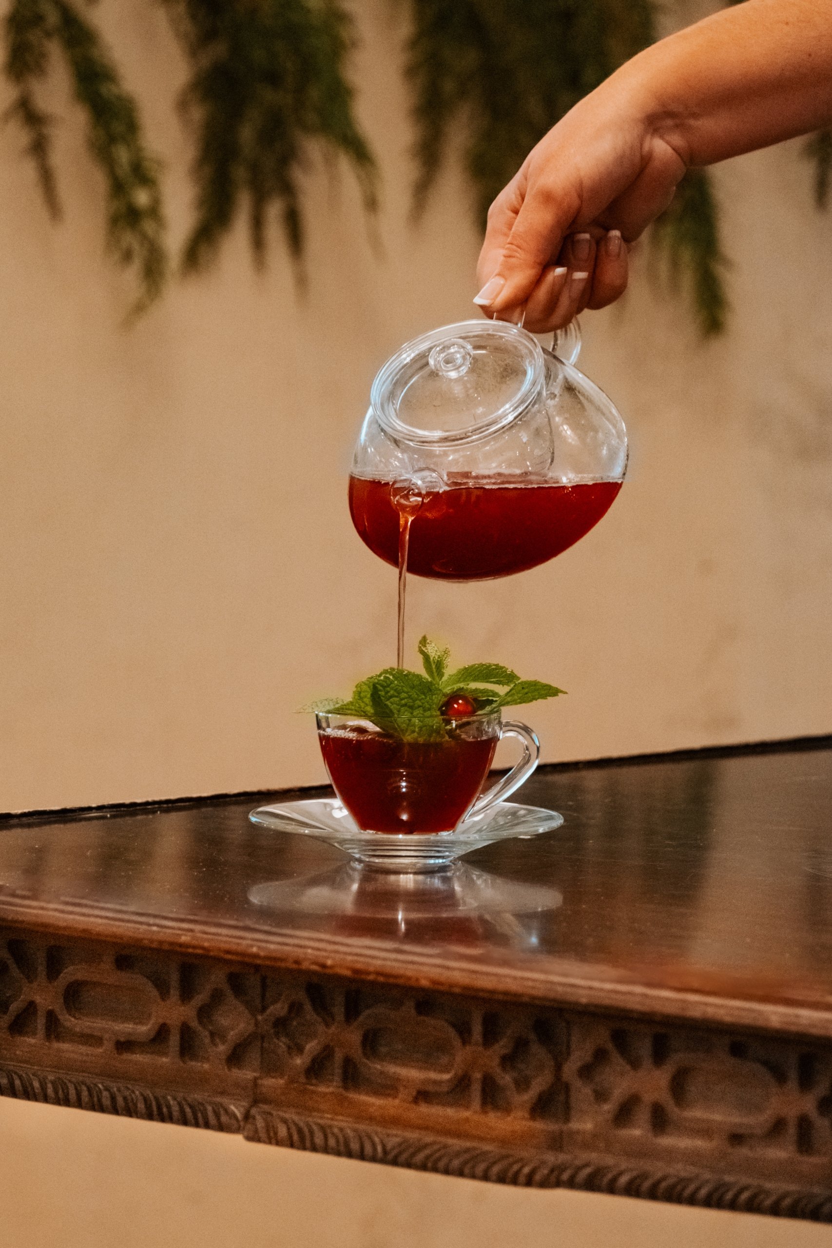 Festive Sunset Sips cocktail in teapot